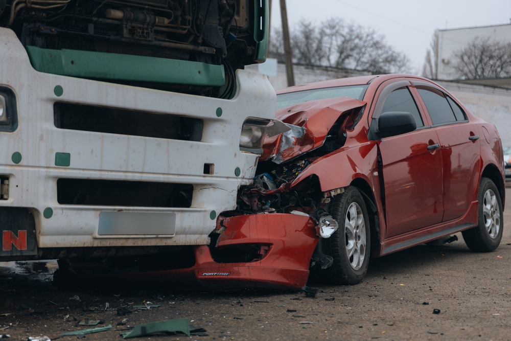 A truck and a car collided on the highway. A serious accident. Road accidents on the road