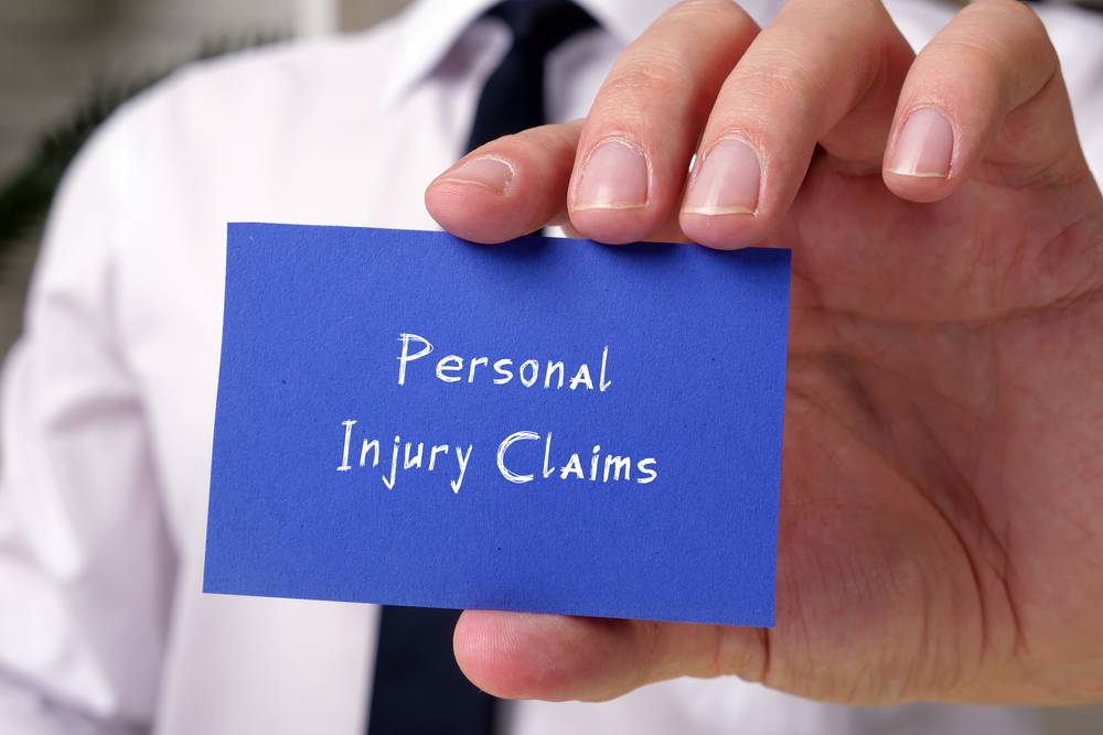 Business concept meaning Personal Injury Claims with inscription on the page.